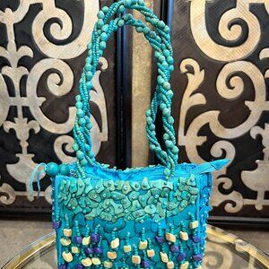Pele handmade turquoise auqua beaded shell handbag